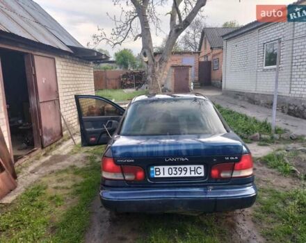 Синій Хендай Лантра, об'ємом двигуна 1.6 л та пробігом 374 тис. км за 1000 $, фото 6 на Automoto.ua