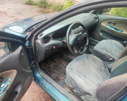 Синій Хендай Лантра, об'ємом двигуна 1.8 л та пробігом 300 тис. км за 700 $, фото 5 на Automoto.ua