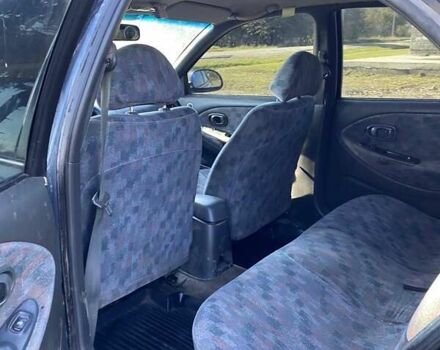 Синий Хендай Лантра, объемом двигателя 1.6 л и пробегом 258 тыс. км за 1500 $, фото 3 на Automoto.ua