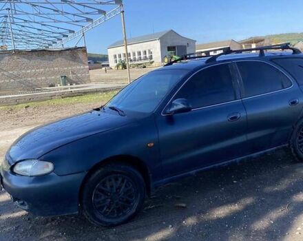 Синий Хендай Лантра, объемом двигателя 1.6 л и пробегом 258 тыс. км за 1500 $, фото 1 на Automoto.ua