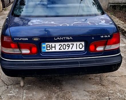 Синий Хендай Лантра, объемом двигателя 1.6 л и пробегом 232 тыс. км за 1200 $, фото 1 на Automoto.ua