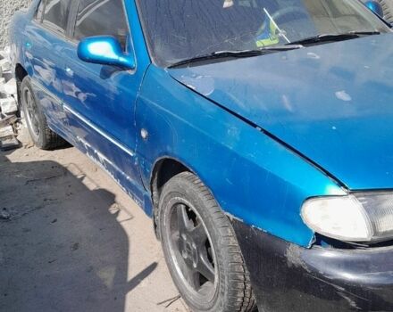 Зеленый Хендай Лантра, объемом двигателя 1 л и пробегом 268 тыс. км за 641 $, фото 6 на Automoto.ua