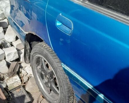 Зеленый Хендай Лантра, объемом двигателя 1 л и пробегом 268 тыс. км за 641 $, фото 4 на Automoto.ua