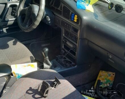 Зеленый Хендай Лантра, объемом двигателя 1 л и пробегом 268 тыс. км за 641 $, фото 5 на Automoto.ua