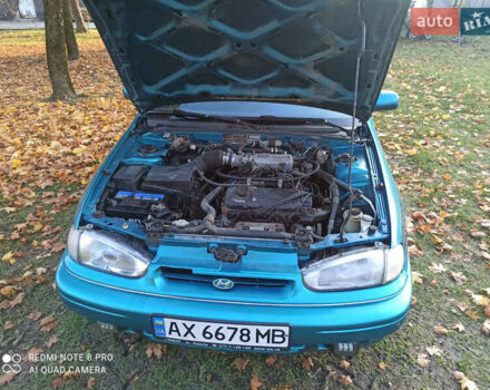 Зелений Хендай Лантра, об'ємом двигуна 1.47 л та пробігом 100 тис. км за 1500 $, фото 4 на Automoto.ua