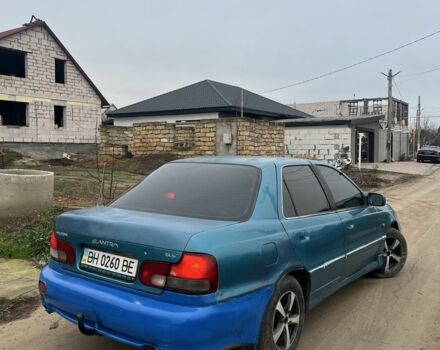 Зеленый Хендай Лантра, объемом двигателя 1.5 л и пробегом 200 тыс. км за 700 $, фото 3 на Automoto.ua