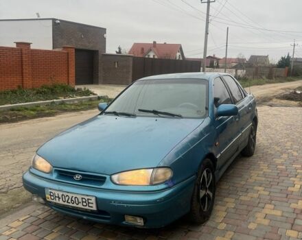 Зеленый Хендай Лантра, объемом двигателя 1.5 л и пробегом 200 тыс. км за 700 $, фото 2 на Automoto.ua