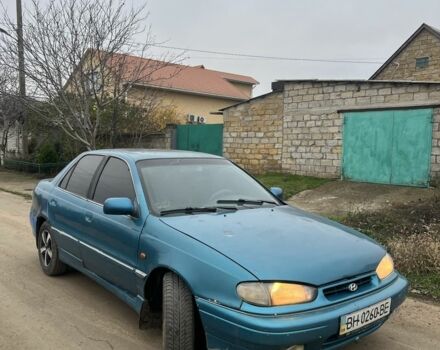 Зеленый Хендай Лантра, объемом двигателя 1.5 л и пробегом 200 тыс. км за 700 $, фото 1 на Automoto.ua