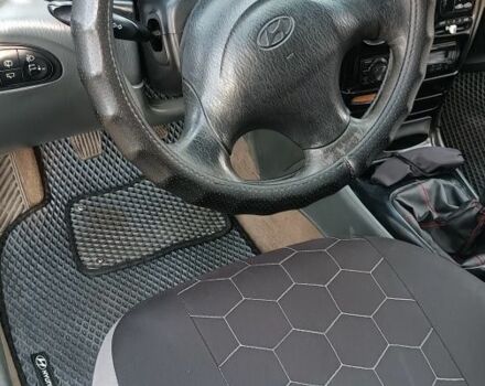 Зеленый Хендай Лантра, объемом двигателя 1.6 л и пробегом 240 тыс. км за 2500 $, фото 9 на Automoto.ua