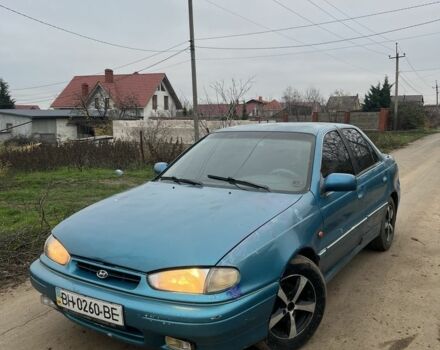 Зеленый Хендай Лантра, объемом двигателя 1.5 л и пробегом 200 тыс. км за 700 $, фото 1 на Automoto.ua