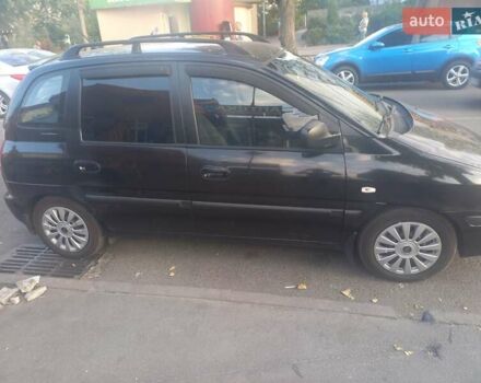 Черный Хендай Матрикс, объемом двигателя 1.6 л и пробегом 250 тыс. км за 3700 $, фото 1 на Automoto.ua