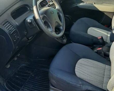 Черный Хендай Матрикс, объемом двигателя 1.6 л и пробегом 272 тыс. км за 4800 $, фото 12 на Automoto.ua