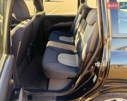 Черный Хендай Матрикс, объемом двигателя 1.6 л и пробегом 129 тыс. км за 5500 $, фото 1 на Automoto.ua