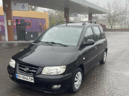 Черный Хендай Матрикс, объемом двигателя 1.8 л и пробегом 334 тыс. км за 3400 $, фото 1 на Automoto.ua