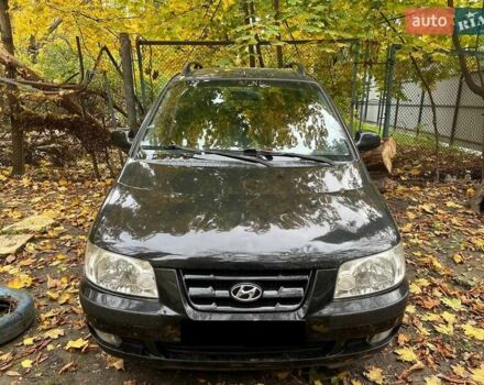 Черный Хендай Матрикс, объемом двигателя 1.8 л и пробегом 334 тыс. км за 3300 $, фото 1 на Automoto.ua