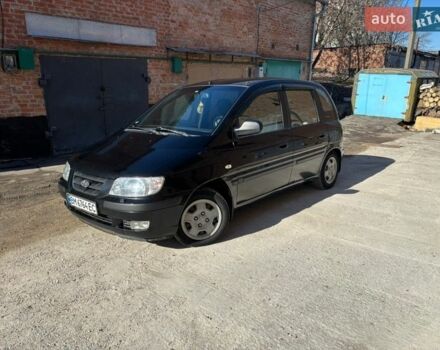 Черный Хендай Матрикс, объемом двигателя 1.8 л и пробегом 211 тыс. км за 3400 $, фото 1 на Automoto.ua