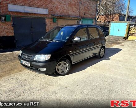 Черный Хендай Матрикс, объемом двигателя 1.8 л и пробегом 211 тыс. км за 3300 $, фото 1 на Automoto.ua