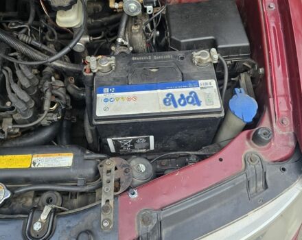 Красный Хендай Матрикс, объемом двигателя 1.6 л и пробегом 336 тыс. км за 3500 $, фото 5 на Automoto.ua