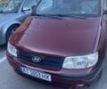 Красный Хендай Матрикс, объемом двигателя 1.6 л и пробегом 189 тыс. км за 3900 $, фото 1 на Automoto.ua