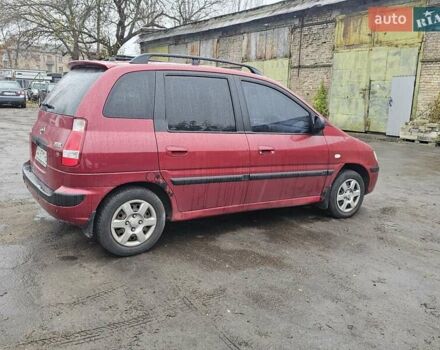 Красный Хендай Матрикс, объемом двигателя 1.8 л и пробегом 200 тыс. км за 1900 $, фото 6 на Automoto.ua