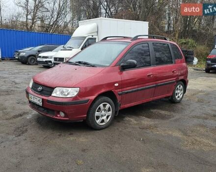 Красный Хендай Матрикс, объемом двигателя 1.8 л и пробегом 200 тыс. км за 1900 $, фото 1 на Automoto.ua