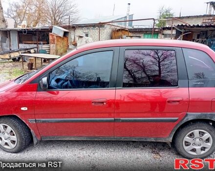 Красный Хендай Матрикс, объемом двигателя 1.6 л и пробегом 270 тыс. км за 3600 $, фото 1 на Automoto.ua