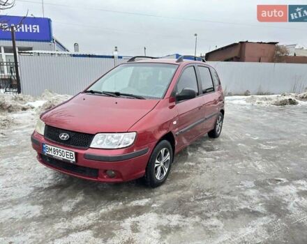 Красный Хендай Матрикс, объемом двигателя 1.8 л и пробегом 299 тыс. км за 3900 $, фото 1 на Automoto.ua