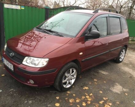 Красный Хендай Матрикс, объемом двигателя 1.8 л и пробегом 174 тыс. км за 4900 $, фото 1 на Automoto.ua