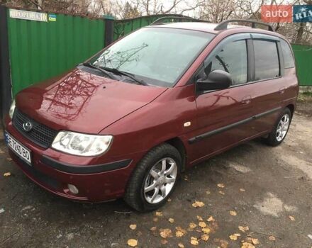 Красный Хендай Матрикс, объемом двигателя 1.8 л и пробегом 174 тыс. км за 4900 $, фото 1 на Automoto.ua