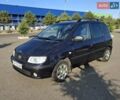 Синий Хендай Матрикс, объемом двигателя 1.6 л и пробегом 245 тыс. км за 3500 $, фото 1 на Automoto.ua
