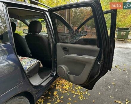Синий Хендай Матрикс, объемом двигателя 1.6 л и пробегом 113 тыс. км за 4800 $, фото 11 на Automoto.ua