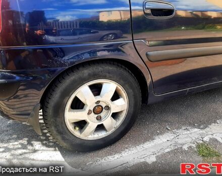 Синий Хендай Матрикс, объемом двигателя 1.6 л и пробегом 252 тыс. км за 3900 $, фото 2 на Automoto.ua