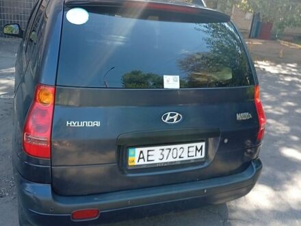 Синий Хендай Матрикс, объемом двигателя 1.8 л и пробегом 350 тыс. км за 4016 $, фото 1 на Automoto.ua