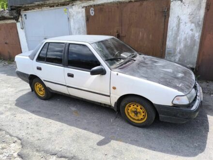 Білий Хендай Поні, об'ємом двигуна 1.5 л та пробігом 300 тис. км за 568 $, фото 1 на Automoto.ua