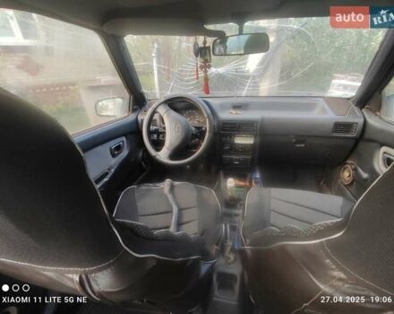 Черный Хендай Пони, объемом двигателя 1.5 л и пробегом 290 тыс. км за 270 $, фото 4 на Automoto.ua