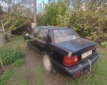 Черный Хендай Пони, объемом двигателя 1.5 л и пробегом 290 тыс. км за 270 $, фото 2 на Automoto.ua