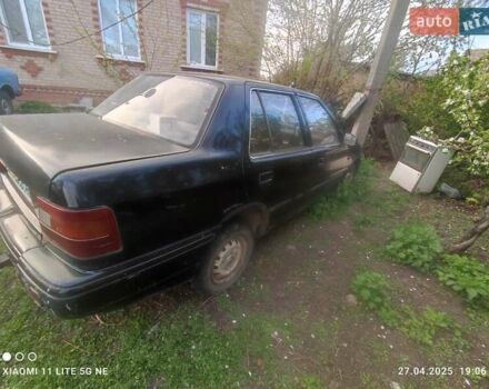 Черный Хендай Пони, объемом двигателя 1.5 л и пробегом 290 тыс. км за 270 $, фото 3 на Automoto.ua