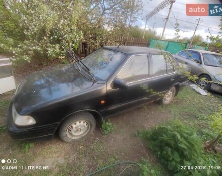 Черный Хендай Пони, объемом двигателя 1.5 л и пробегом 290 тыс. км за 270 $, фото 1 на Automoto.ua