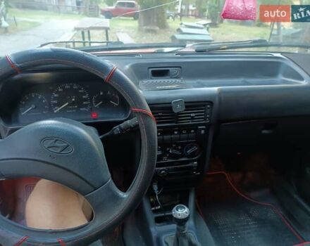Красный Хендай Пони, объемом двигателя 1.5 л и пробегом 180 тыс. км за 1400 $, фото 12 на Automoto.ua