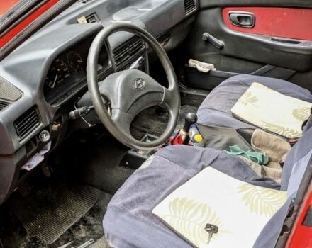 Красный Хендай Пони, объемом двигателя 1.3 л и пробегом 339 тыс. км за 700 $, фото 7 на Automoto.ua