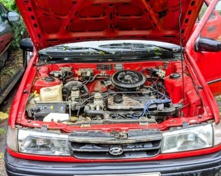 Красный Хендай Пони, объемом двигателя 1.3 л и пробегом 339 тыс. км за 700 $, фото 6 на Automoto.ua