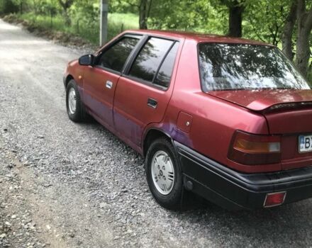 Красный Хендай Пони, объемом двигателя 1.3 л и пробегом 300 тыс. км за 760 $, фото 1 на Automoto.ua