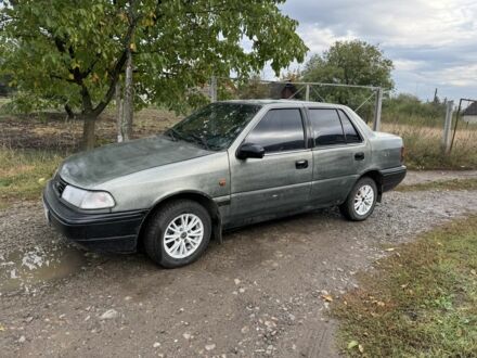 Сірий Хендай Поні, об'ємом двигуна 1.5 л та пробігом 54 тис. км за 1300 $, фото 1 на Automoto.ua