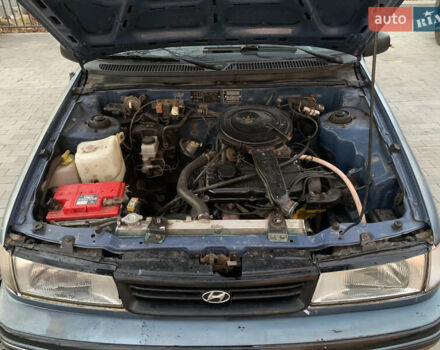 Синий Хендай Пони, объемом двигателя 1.47 л и пробегом 300 тыс. км за 1000 $, фото 5 на Automoto.ua