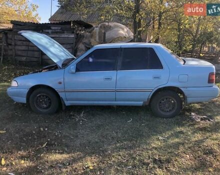 Синий Хендай Пони, объемом двигателя 1.5 л и пробегом 315 тыс. км за 1100 $, фото 1 на Automoto.ua