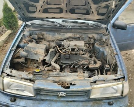 Синий Хендай Пони, объемом двигателя 1 л и пробегом 228 тыс. км за 600 $, фото 3 на Automoto.ua