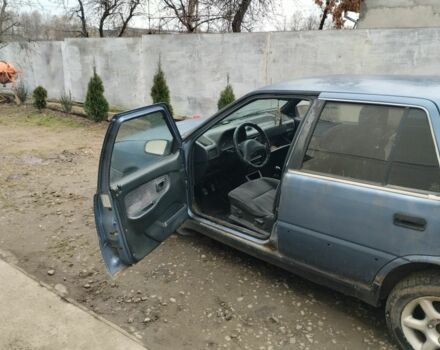 Синий Хендай Пони, объемом двигателя 1 л и пробегом 228 тыс. км за 600 $, фото 2 на Automoto.ua