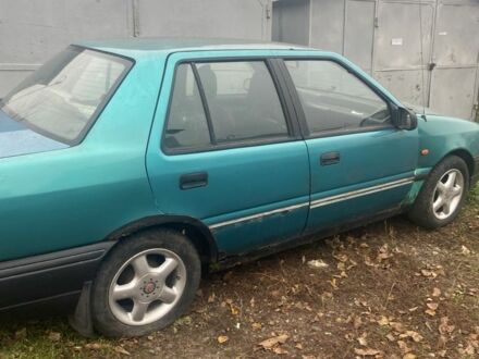 Зеленый Хендай Пони, объемом двигателя 1.5 л и пробегом 230 тыс. км за 1100 $, фото 1 на Automoto.ua