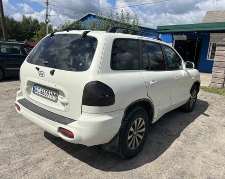 Белый Хендай Санта Фе, объемом двигателя 2.7 л и пробегом 270 тыс. км за 4550 $, фото 5 на Automoto.ua