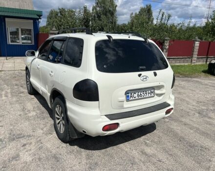 Белый Хендай Санта Фе, объемом двигателя 2.7 л и пробегом 270 тыс. км за 4550 $, фото 6 на Automoto.ua